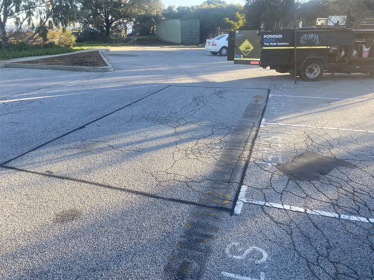 Before image of an asphalt cut & replace repair in Mosman Park, Western Australia for The Beehive Montessori School.