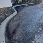Completed asphalt driveway extension in O'Connor, Western Australia for Midolo Building Services.