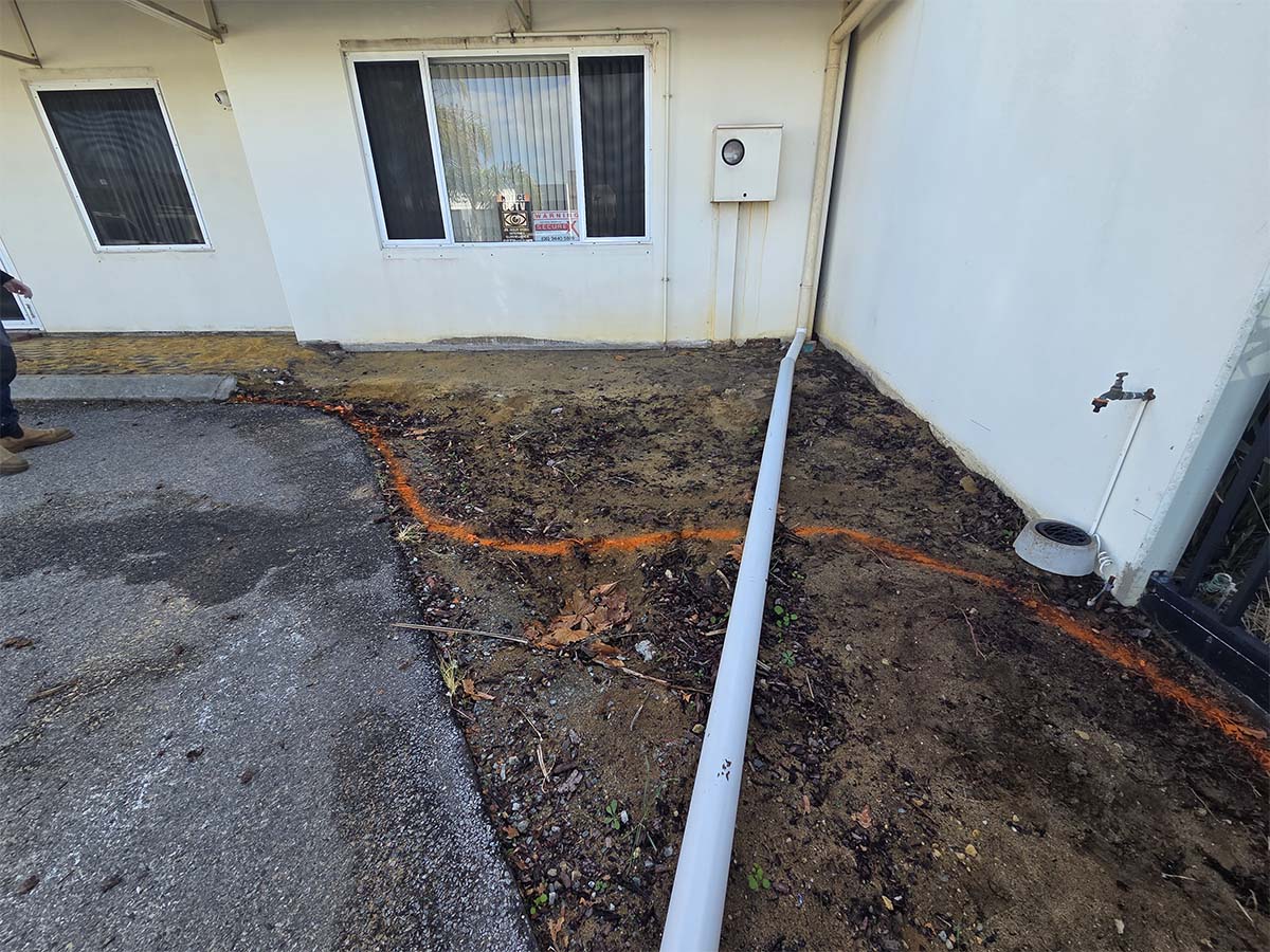 Before image of an asphalt driveway extension in O'Connor, Western Australia for Midolo Building Services.