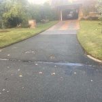 Before image of a asphalt driveway crossover resheet in St James, Western Australia for a private customer.