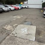 Before image of an Asphalt Patch Repair for IB Property in Kingsgrove, New South Wales