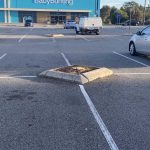 Before image of an asphalt patch repair in Joondalup, Western Australia for DB Complete Building Services.