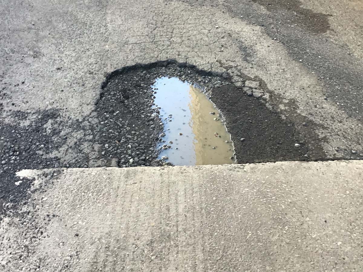 Before image of an Asphalt Cut and Replace Repair for CIP Build at Penrith Police Station, New South Wales