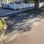 Before image of a asphalt driveway crossover resheet in Daglish, Western Australia for a private customer.